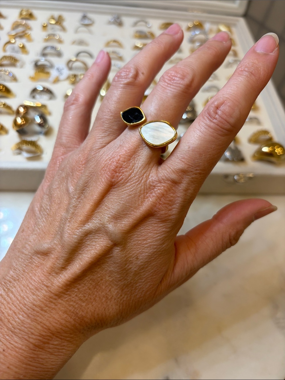 Gold Open Band Ring with Black and White Stone Accents Stainless Steel.